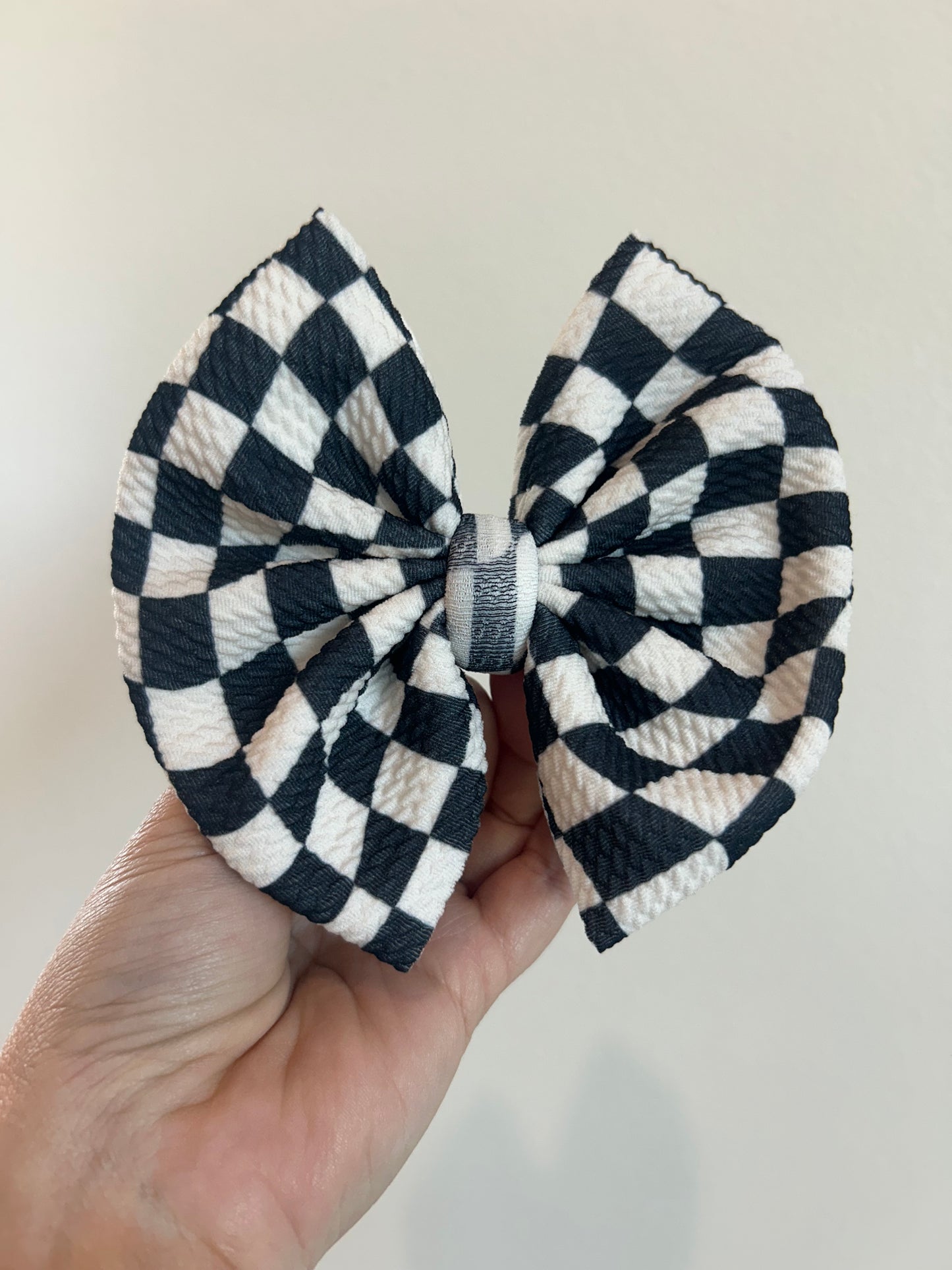 BIG CLIP BOW - BLACK/WHITE GROOVY CHECKERED